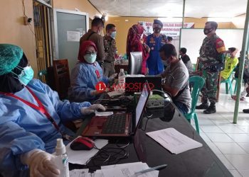 Warga Natar Antusias Ikut Vaksinasi Massal TNI-Polri