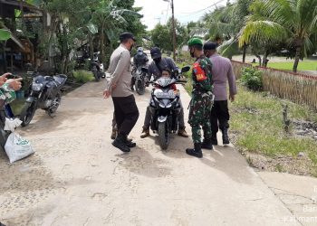 Tertib 5M, Satgas Ops Yustisi Karau Kuala Ajak Masyarakat di Pasar Selalu Disiplin Prokes